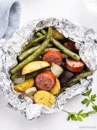 All you need is a little aluminum foil, and you can make basically anything: Kielbasa And Vegetable Foil Packets Belly Full