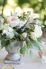 Your chicago flower stock images are ready. Botanical Market Style Centerpiece In Natural Stone Compote Holiday Flower Arrangements Beautiful Flower Arrangements Beautiful Flowers Photography