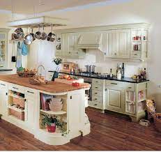 Country kitchens of yesteryear went hand in hand with the farmhouse outside. English Country Style Kitchens Cottage Style Kitchen English Country Kitchens Cottage Kitchen Design