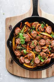 Tie casing at the end into a knot. Italian Sausage Onions And Peppers Skillet Ready In Less Than 25 Minutes