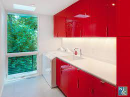 Red High Gloss 3d Laminate Makes This Laundry Room So Lux Modern Laundry Rooms Laundry Room Sleek Storage