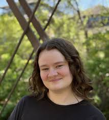 Meredith Reid, (she/her)