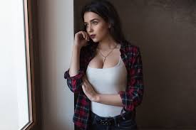 The minimalist revolution is here. Woman Wearing Black And Red Plaid Flannel Shirt Standing Near Window Hd Wallpaper Wallpaper Flare