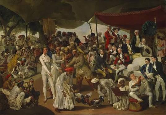 A cock fighting event at the court of the Nawab of Oudh in northern India. While cockfighting was condemned in Britain as cruel, in India it became entertainment—where British officials indulged in