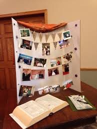 Funeral Or Memorial Photo Board Using Twine Mini Clothespins And A Trifold Board Doesn T Damage Photos We Als Trifold Board Photo Boards Celebration Of Life