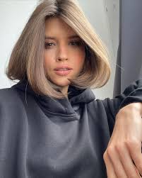 Even if you aren't by a beach, this platinum cut will make you feel like you are. The Airy Bob Haircut Is Like Your Own Personal Wind Machine Glamour