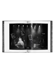 Open a blank white notebook, pen and coffee on the desk. The Best Coffee Table Books For Your Home 2021