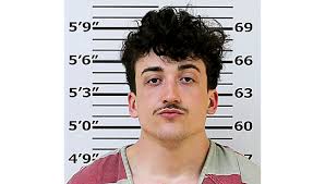 Man charged in connection with vehicle stolen at gunpoint