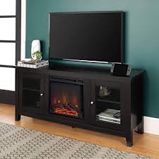 Electric fireplace inserts come in a wide variety of sizes, shapes and which can be combined with furniture such as corner tv stands, fireplace media centers, mantels or bookshelves. Amazon Com Walker Edison We Furniture Traditional Wood Fireplace Stand For Tv S Up To 64 Living Room Storage 58 Black 24 Inches Tall Model Az58fp4dwbl Furniture Decor