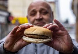 Blackpool: Burger stall chef tells how he keeps price at £1