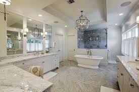 Tiled using white marble and complemented by a spacious bath. Master Bathroom Ideas Luxury White Marble Bathroom Novocom Top