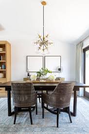 Two (2) club chairs and one (1) table. Brown Wicker Chairs At Dark Brown Wooden Table Transitional Dining Room