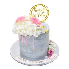Celebrate the season with this majestic centerpiece of sparkling silver and glamorous gold. Grey Silver Cake With Pink And White Flowers