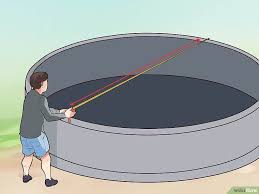 How To Build A Deck Around An Above Ground Pool With Pictures Building A Deck In Ground Pools Decks Around Pools