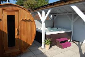 A log cabin with its own hot tub can provide the perfect weekend away for couples who just want to cosy up for some quality time together. Romantic Hot Tub Lodge With Sauna For Couples Scotland Pitlochry