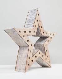 Small pieces of driftwood were gathered on the shoreline then simply glued onto plywood. Sass Belle Led Large Star Standing Christmas Decoration Asos