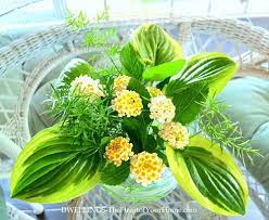 Dwellings The Heart Of Your Home On The Screened Porch Flower Arrangements Arrangement Floral Arrangements