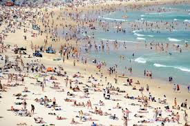 Christmas In Australia Bondi Beach Is Full On Christmas Day Christmas In Australia Sydney Beaches Australia Travel