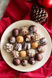 Top Down View Of A Plate Of Chocolate Truffles Homemade Chocolate Truffles Almond Joy Truffles Recipe Christmas Cakes Easy