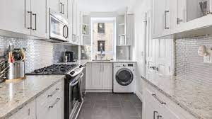 Our laundry signs are decorative and functional performing double duty as a clothing rack. 9 Small Laundry Room Ideas For The Tiniest Of Apartments Architectural Digest