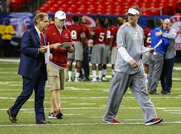 Lane kiffin, right, poses with men's athletic director mike hamilton after being introduced at a press conference by monday, dec. Nick Saban Lane Kiffin Leaving Alabama Going To Fau