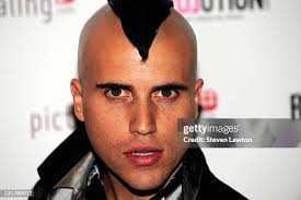 Neon Trees frontman Tyler Glenn arrives at a charity masquerade ball...  News Photo