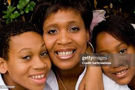 Mother And Daughter Smiling Closeup Portrait High-Res Stock Photo