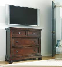 The classic design elements—including bun feet—are easy to love. Ashley Porter Rustic Brown Media Chest On Sale At Spokane Furniture Company Serving Spokane Post Falls Coeur D Alene Wa Spokane Valley Post Falls And Coeur D Alene Id