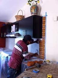 Can't believe she re-painted & removed the Mexican tile!!