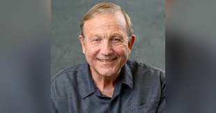 Dr. Grant Christensen (September 21, 1945