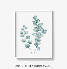 For an affordable décor option, spray paint a twig and accessorize it with mini ornaments. Twig Print Unframed Poster Home Decor Wall Art Watercolour Blue Branch