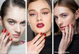 Fall Winter 2020 2021 Nail Trends Red Nail Polish Nail Trends Red Nails Happy new year, 2021 numbers on green fir branches and holiday ornaments on white background.
