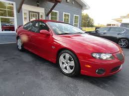 Image result for Medium Red Mica 2004 Pontiac