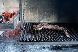 The hearth with grate allows wood to be burned into hot coals which bar b que pits and barbeque trailers. Carne 1 Year In Argentina
