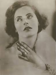 Two ladies in tight-skirted suits by Whitley Tailleurs New York 1950