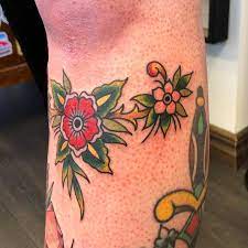 Back tattoos of a woman; Under Knee Flowers Kungalv Tattoo No Worries Tattoo Facebook