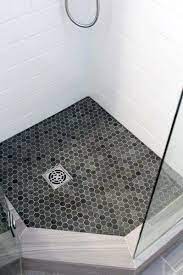 Glass pebble tiles are resistant to stains, mold, mildew and are very easy to clean. Top 50 Best Shower Floor Tile Ideas Bathroom Flooring Designs Beautiful Bathroom Renovations Shower Floor Tile Shower Tile