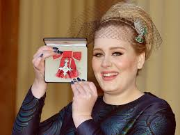 Adele receives royal honor from Prince Charles