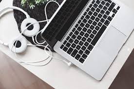 While many people stream music online, downloading it means you can listen to your favorite music without access to the inte. Download Music Multimedia Laptop Setup With Headphones Free Stock Photo Multimedia Mobile Computing Laptop