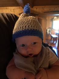 This is my grandson Marshall. He is wearing a hat my son crocheted for him!