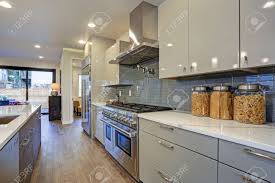 But that doesn't mean they have to be lacking in warmth or personality — there are a number of ways to approach a modern look, from gleaming stainless steel finishes to natural woods. Sleek Modern Kitchen Design With A Kitchen Peninsula Fitted With Stock Photo Picture And Royalty Free Image Image 97874331