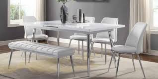 Side chairs are in a classic rake back design. White Dining Table And Chairs Efistu Com