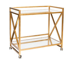This cart's two spacious mirrored glass shelves provide perfect platforms for storing bottles of spirits and mixing craft cocktails, while four castor wheels offer effortless mobility to serve guests. Gold Leafed X Bar Cart With Mirrored Tops Burke Decor