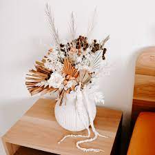 Whether you have dried flowers grouped in a wreath or arrangement, or single dried flowers for use in craft projects, you must care for them so they last as long as possible. How Long Do Dried Flowers Last Sunshine Coast Dried Flower Bar