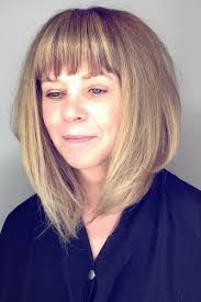 Front bangs turn on your bob and give a chic, edgy vibe to your style. Long A Line Haircut With Bangs Picture1 Hairs London