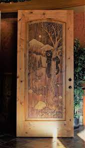 We also have quite a selection of exterior wood doors, including our hand carved wood doors, knotty alder doors, knotty pine doors, knotty cedar doors, and exterior wood paneled doors. Carved Bear Door Eagle Wall Art Carved Doors Bear Carving