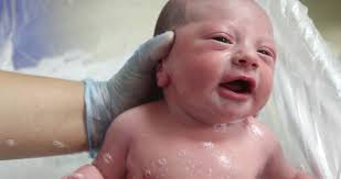 Which is why, after the baby has been delivered, most mothers look forward to getting a nice warm bath after ages. Newborn Baby Crying While Taking Stock Footage Video 100 Royalty Free 1038334091 Shutterstock