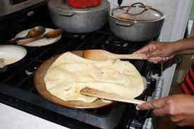 Trinidad Buss Up Shut Roti Step 25 Trini Food Roti Bread Recipes Sweet