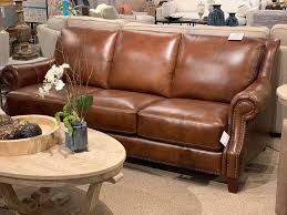 This deluxe faux leather platform bed features a headboard and low profile footboard style frame, with wood slats and exposed feet for support. 3963 62s Bassett Pierce 88 Leather Sofa Rudd Furniture
