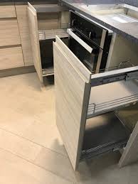 Grey gloss kitchen units with oak worktop offcuts appendix location. Ex Display Wood Grain Grey Gloss Kitchen The Used Kitchen Company